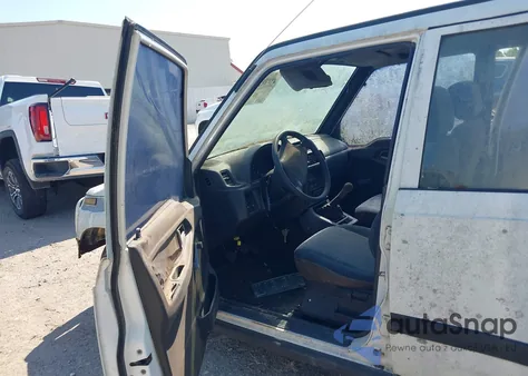 1996 Geo Tracker from USA, damaged, VIN 2CNBE1369T6943219